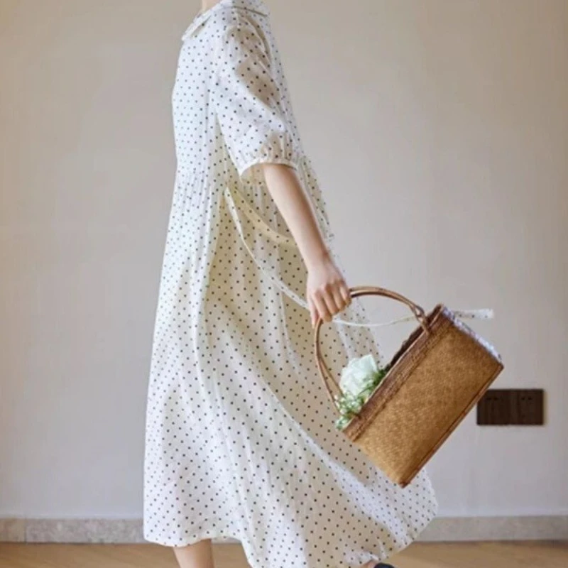 

French Short-sleeved Dress Spring/Summer 2025 Women's Lapel Design Sense Wave Point Loose Temperament Medium-long Skirt.