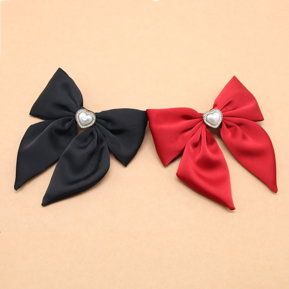 קליפ ראש מתכתי עם קשת סאטן חלקה בצבע אחיד לבנות עם פנינה ואבן חן אלגנטית לאביב/קיץ