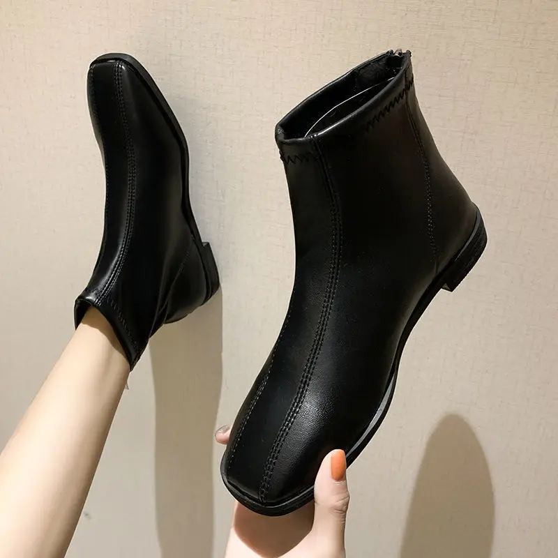 Botas de mujer de lujo de cuero Artificial, mocasines tobilleros informales, zapatos negros cálidos para exteriores, zapatos de Otoño Invierno para mujer, tendencias 2024