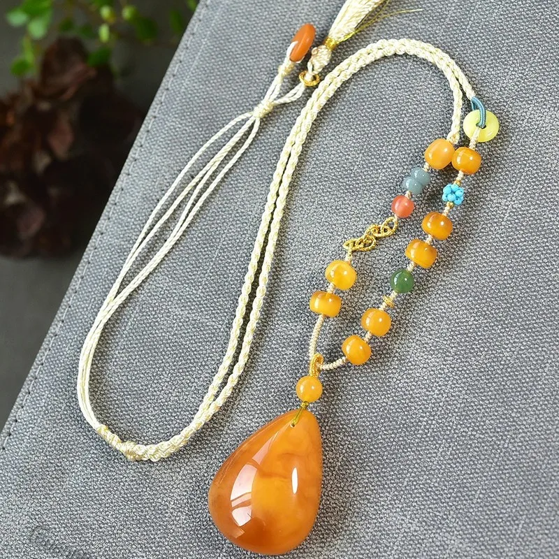 Natural drop full of honey date-red old flower wax hand-woven rope beeswax pendant