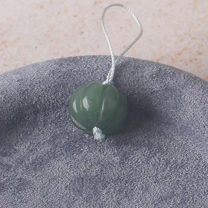 

Green Aventurine Pumpkin-Shaped Pendant with Light Blue Cord: Single Natural Stone Piece, Ideal for Handmade Jewelry