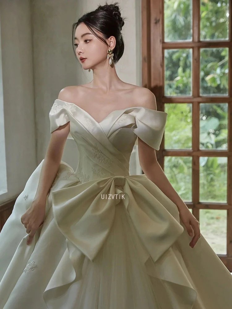 فساتين زفاف بيضاء فاخرة من الساتان للنساء 2026 فستاين سهرة/فساتين الحفلات بدون أكتاف وأربطة طول الأرض Vestidos De Novia مصنوعة حسب الطلب