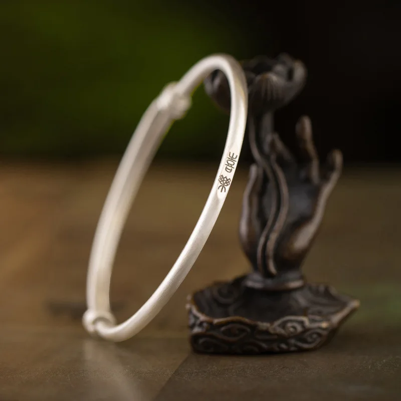 S999 sterling silver new Chinese-style engraved push-pull silver bracelet. Ancient style matte plain ring with adjustable design