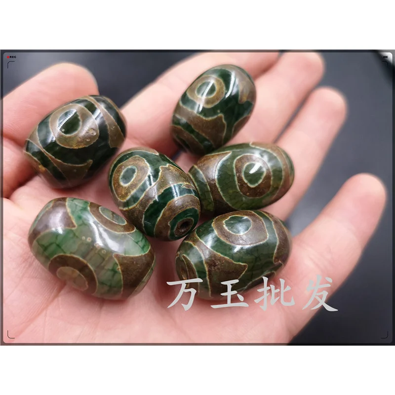 خرز عقيق Tianzhu ذو ثلاث عيون فضفاض