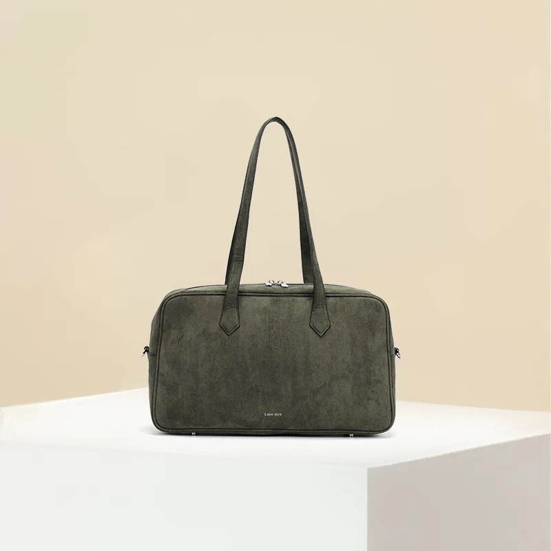Simulated suede fabric ladies bowling bag for shoulder carry. Suitable for commuting. Fashionable lightweight and large capacity