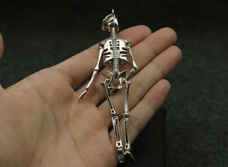 Creative and personalized retro pure silver humanoid skull funny pendant, European and American creative jewelry, punk Thai silv