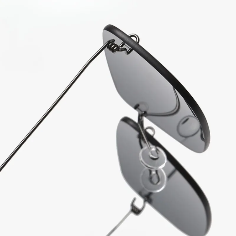 

Denmark Luxury Designer Rimless Sunglasses for Men New Ultralight Aviation Stainless Steel Screwless Eyewear UV400 Sun Glasses