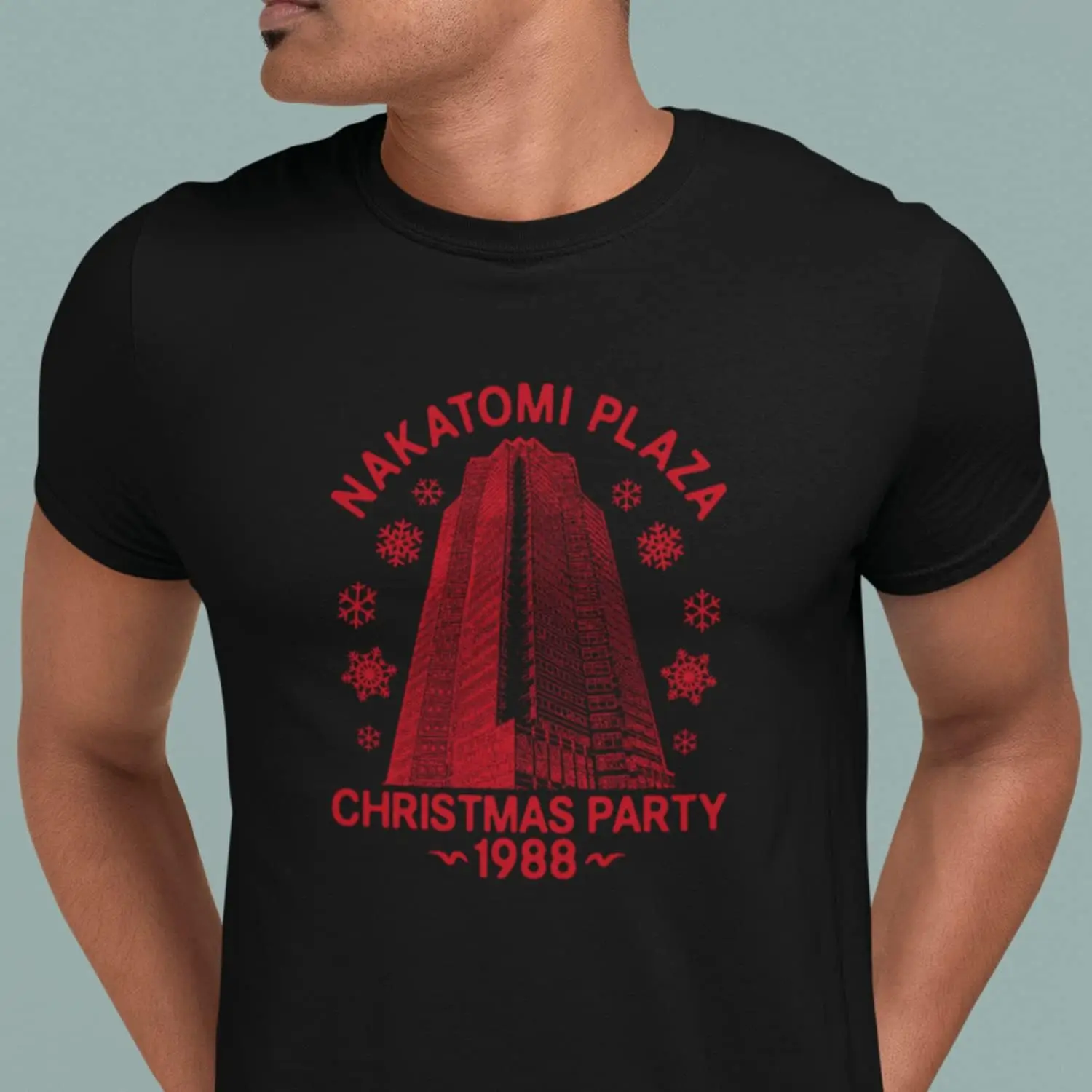 ناكاتومي بلازا الكبار حفلة عيد الميلاد تي شيرت 1988 المباحث فيلم فيلم العمل الأمريكي مستوحاة من الإثارة الجولة الرقبة القطن المحملة