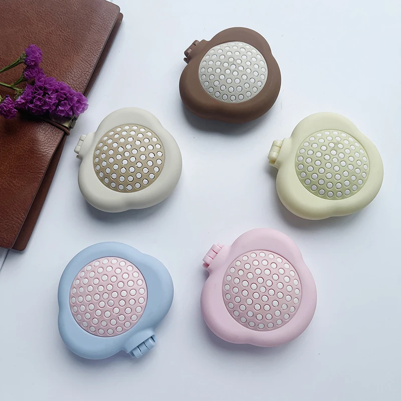 مشط شعر صغير محمول مع مرآة لصالونات تصفيف الشعر، فرشاة شعر صغيرة الحجم قابلة للطي للتدليك 2 في 1، مشط وسادة هوائية