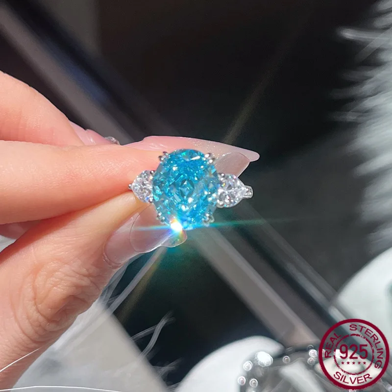 

New S925 Silver Sea Blue Ice Flower Cutting Ring for Women 10 * 12 Elliptical European and American Trendy Versatile