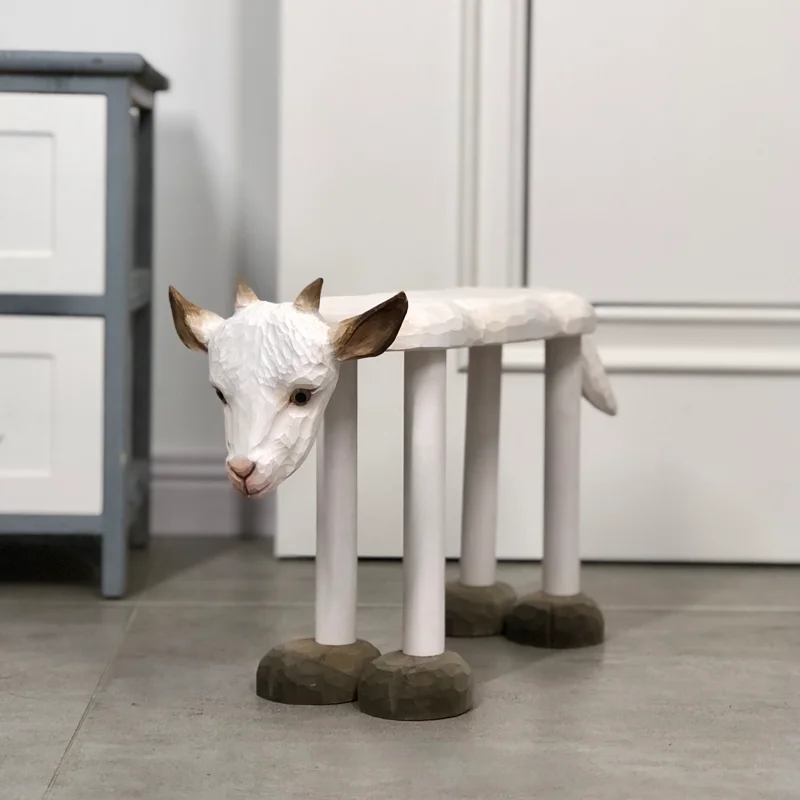 Solid wood handmade carved medium white goat lamb low stool for changing shoes at home entrance in Nordic Europe