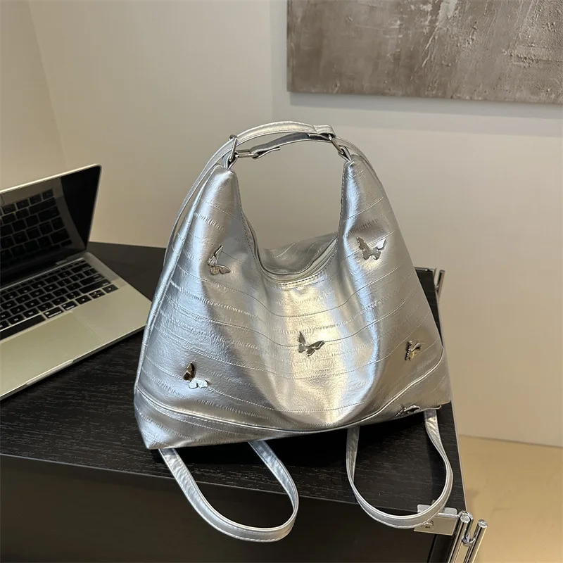 

Нишевый серебряный рюкзак 2025 года для женщин, летняя модная большая сумка, универсальный рюкзак большой вместимости, модный повседневный рюкзак