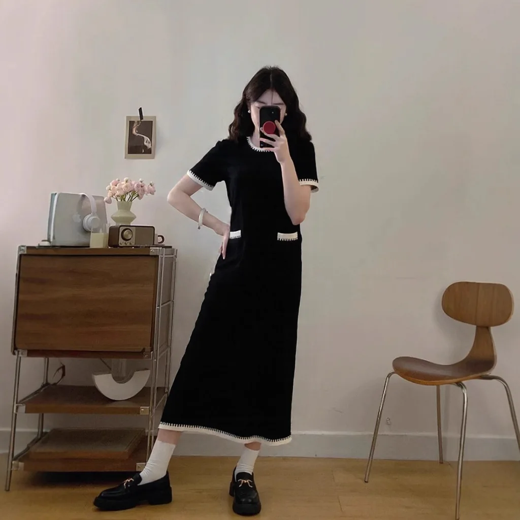 8144 Fragancia de alta sociedad de estilo francés, Tencel perezoso suelto, cuello redondo, bloque de Color blanco y negro, diseño de bolsillo falso, recto y largo