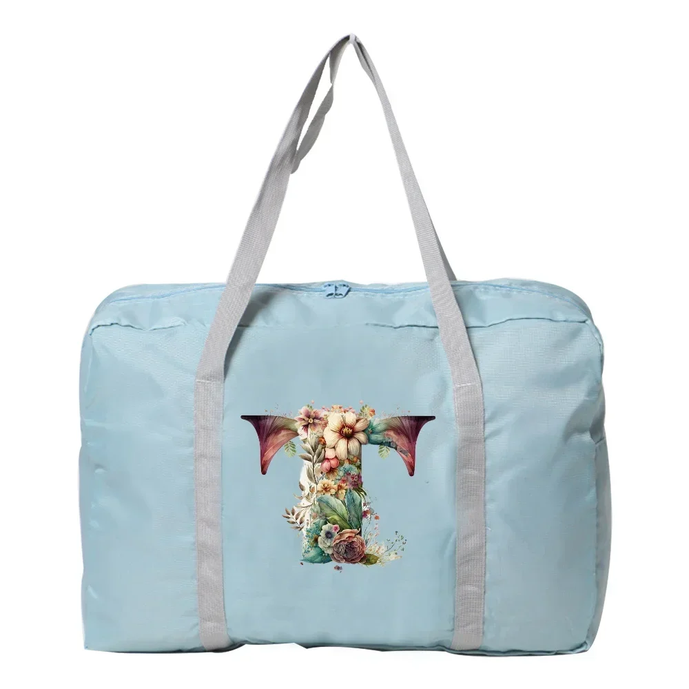 Рисунок 6 - Ручная дорожная сумка с цветочным узором и принтом