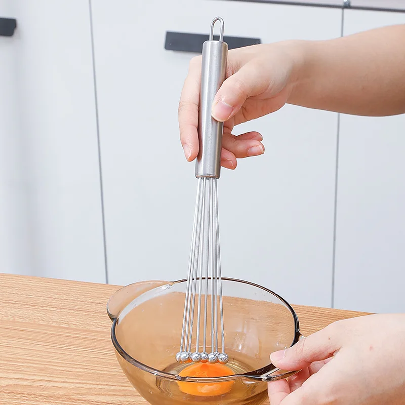 2026 New 12 Inch Kitchen Egg Beater Stainless Steel Ball Mixer Manual Metal Egg Beater for Cooking Mixing Kitchen Necessities