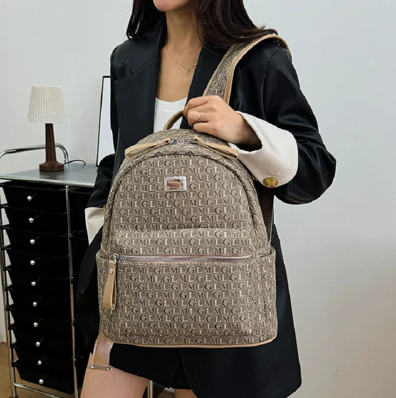 

2026 Women's High Quality Leather Travel Backpacks Fashion Letter Printed Designer Shoulder Bags Totes Large Capacity School Bag