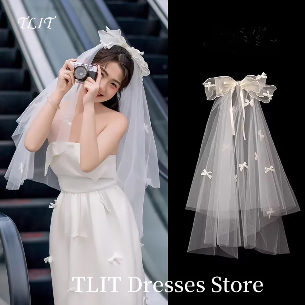 

TLIT Delicate Big Bow and Little 3D Bows Bride Wedding Veil Short Fingertip Bridal Tulle Veil with Comb and Cut Edge Customized