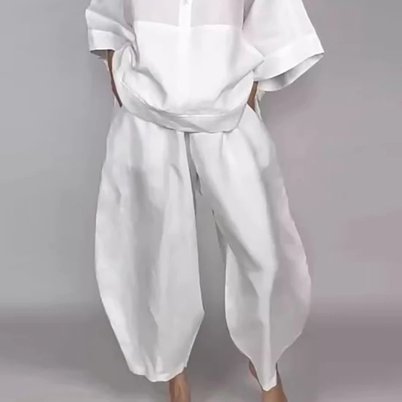 بنطال رياضي صيفي غير رسمي للنساء 2026 ربيعي عالي الخصر بجيوب فضفاض بلون سادة بخصر مطاطي للنساء ملابس