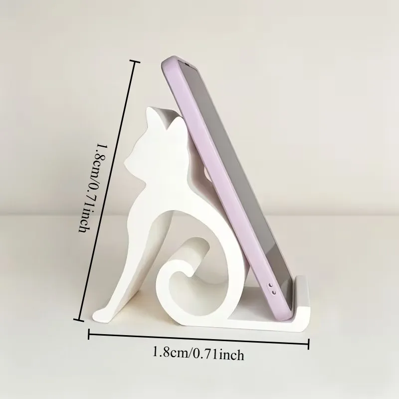 White Cute Cat Phone Stand holding a smartphone, with dimension lines indicating 1.8cm/0.71inch height and width.