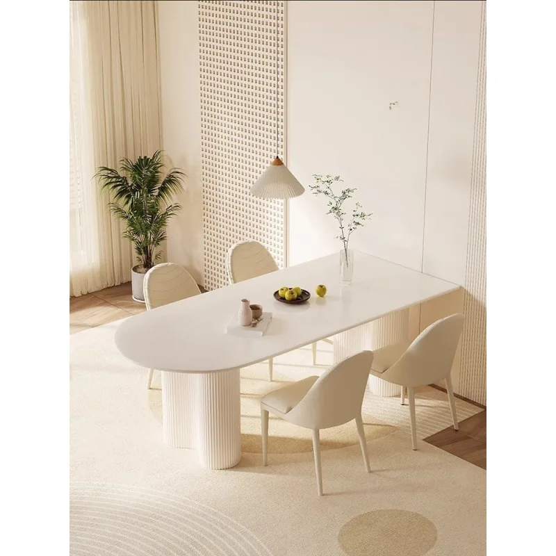 Light luxury island rock slab, dining table peanut rack, modern simple cream style small apartment dining table combination r