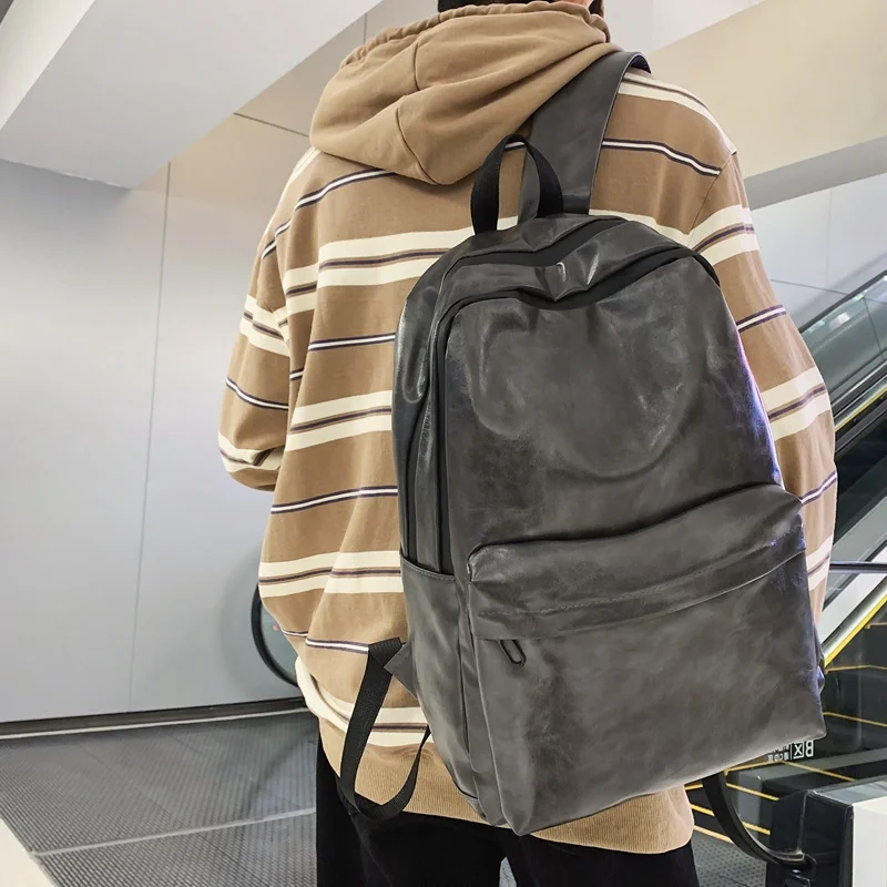 Mochila de couro macio impermeável para homens, Mochila masculina vintage, Minimalismo viagem sólida para estudantes universitários da escola