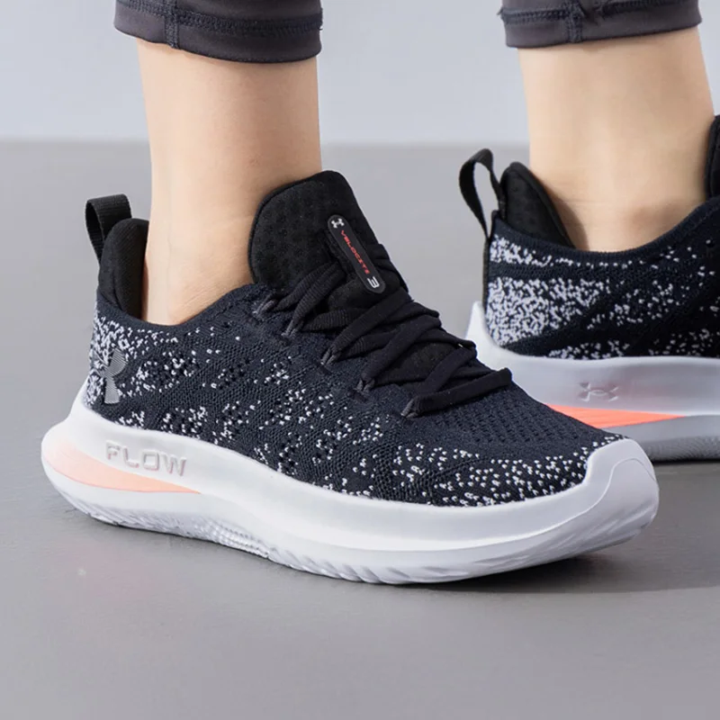 

Under Armour Women's FLOW Series Sports Shoes with Black Mesh, White Specks and Pink Accents