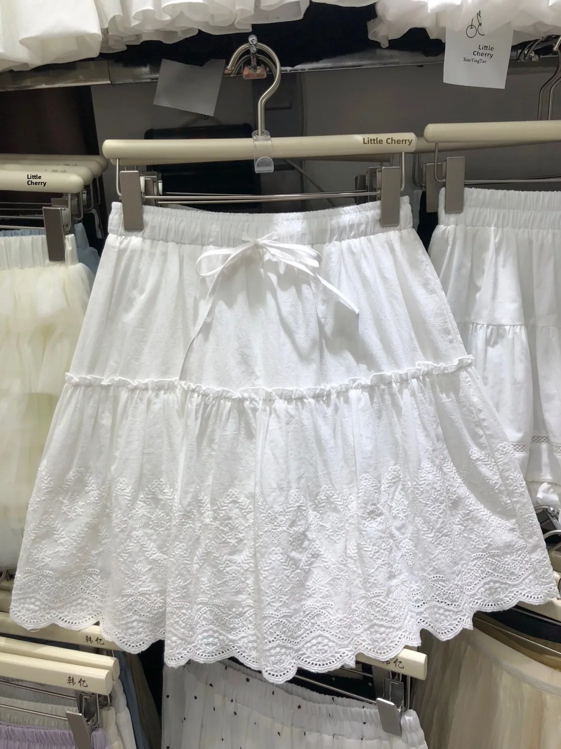 

Белая короткая юбка с вышивкой и завязками на талии, пышная А-образная юбка средней длины с узором под дерево, летняя модная женская одежда