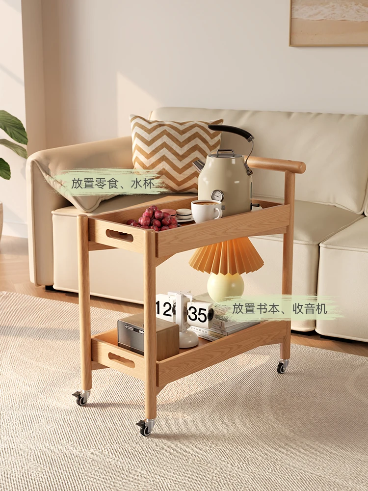 A few solid wood trolleys beside the sofa, movable side cabinets, wheeled bedside racks, simple.