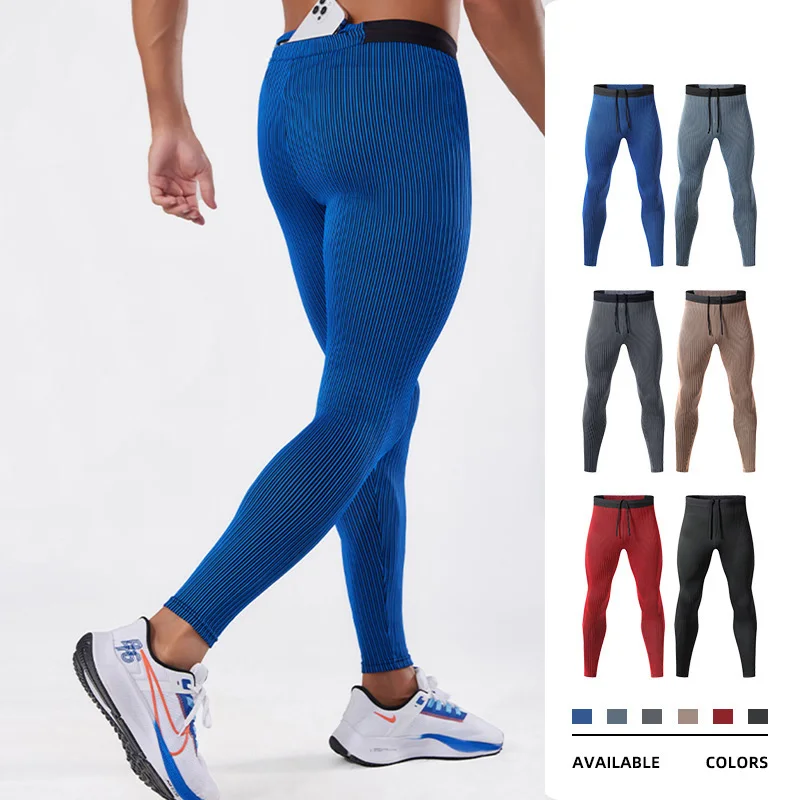 Mężczyźni na zewnątrz legginsy do biegania kieszonkowe do ćwiczeń Fitness legginsy do koszykówki wędrówki treningi sportowe piłka nożna odzież kompresyjna 24