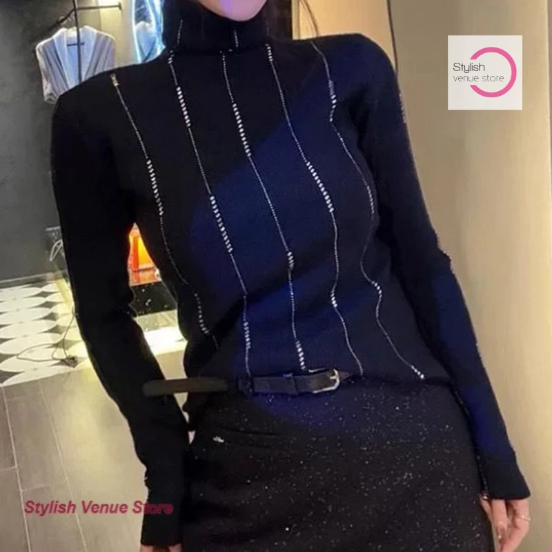 

Korean high-necked rhinestone temperament sweater women's autumn and winter new fashion soft waxy casual bottoming Joker top.