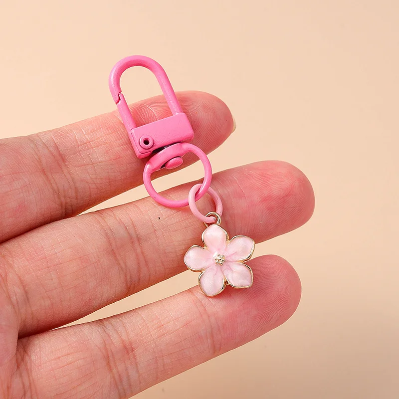 Aihua Niedlicher Klingelnder Blumen-Schmetterling-Herz-Schlüsselanhänger für Frauen und Mädchen, Handtaschenanhänger, Schlüsselkette, Schmuckzubehör, Geschenke – Detail 19