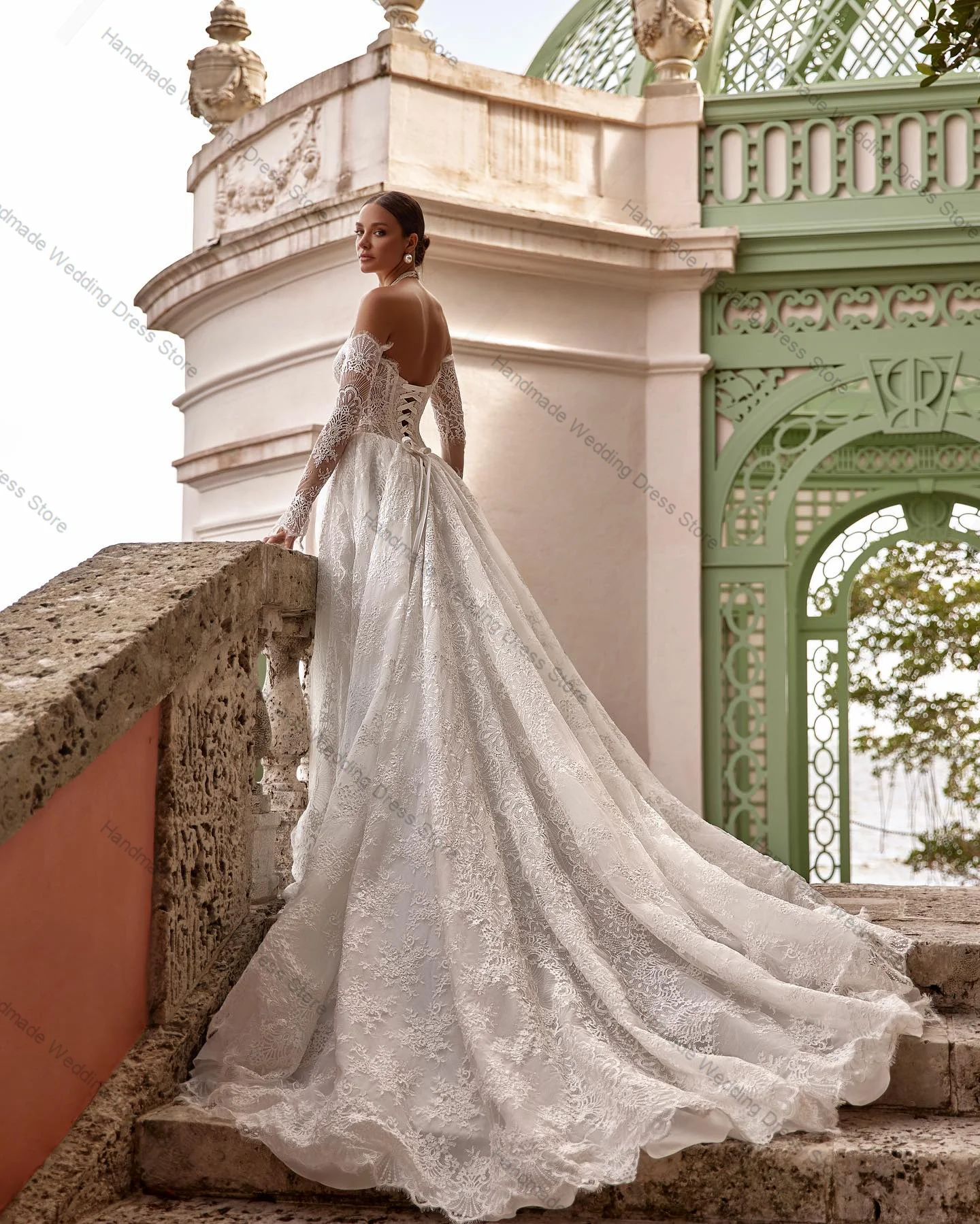 Abito da sposa elegante con applicazioni sexy con spalle scoperte maniche lunghe una linea Boho abito da sposa personalizzato con lacci sul retro abito lungo da chiesa