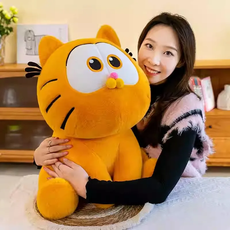 オレンジ色のガーフィールドのぬいぐるみ猫。遊び、抱きしめ、寝るのに最適です。彼女への誕生日プレゼントに最適です。