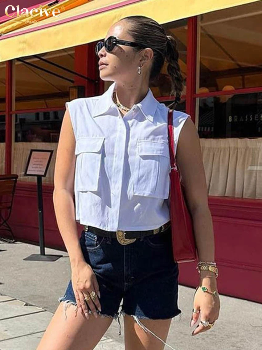

Летняя свободная белая хлопковая женская рубашка Clacive 2026: модная блузка без рукавов с отложным воротником, элегантный классический топ с карманами для женщин