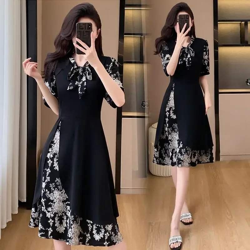 

Plus size dress female summer 2024 new floral stitching high sense floral temperament slim fake two little black dresses.