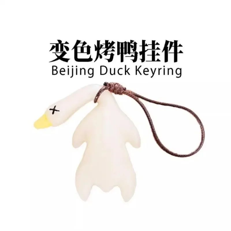 Pendentif canard rôti à couleur changeante, sera changer de couleur lors exposé aux rayons ultraviolets, porte-clés drôle de canard rôti par parodie