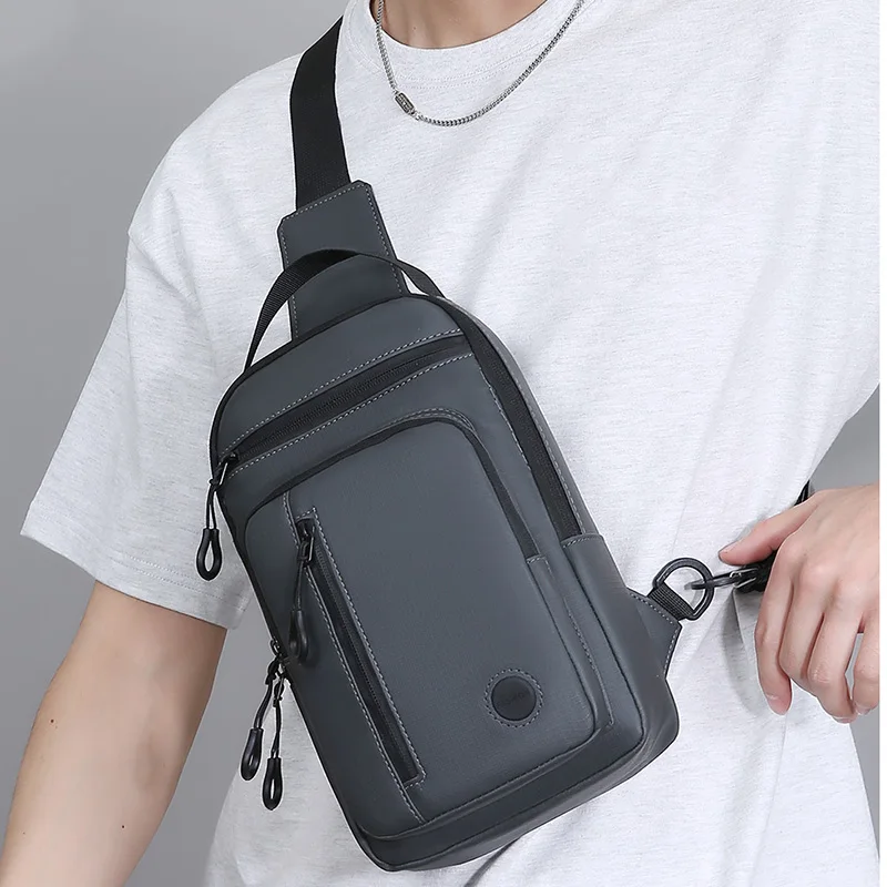 

Men's Crossbody Bag with Mobile Phone Pocket, Adjustable Shoulder Strap, Multi Pocket Chest Bag, Suitable for Leisure, Sports
