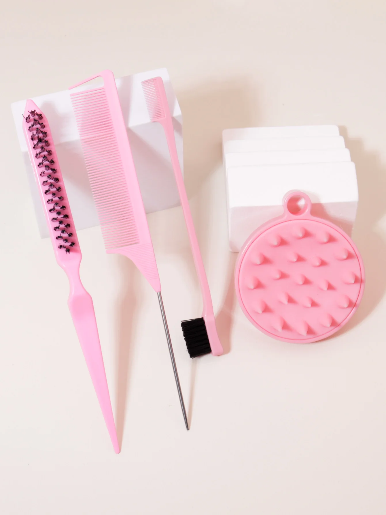 Comb styling set with nylon hair brush, steel needle pointed tail comb, edge control brush, and scalp massage brush