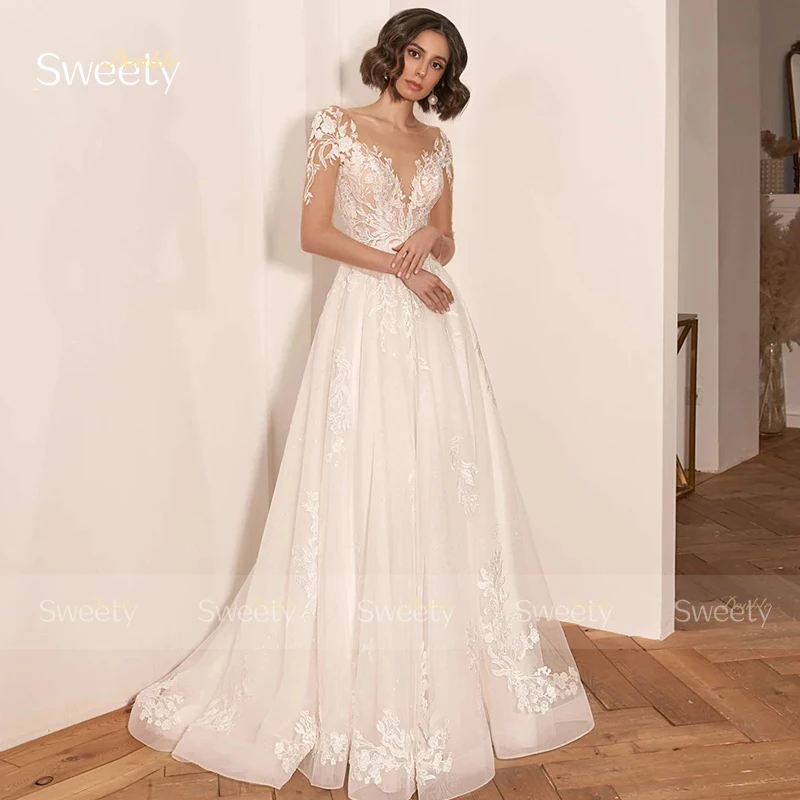 Robe de Mariée Élégante en Organza avec Dentelle Brodée, Ligne A, Longueur au Sol, Col Rond, Manches Courtes, Bouton pour Patients