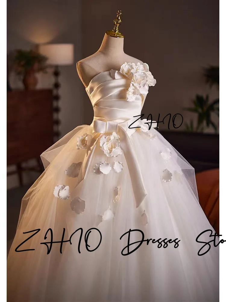 ZHIO Principessa Fiori 3D Abito da sposa Senza spalline A-Line Lunghezza pavimento Tulle avorio Corea Servizio fotografico Abito da ricevimento nuziale Personalizzato
