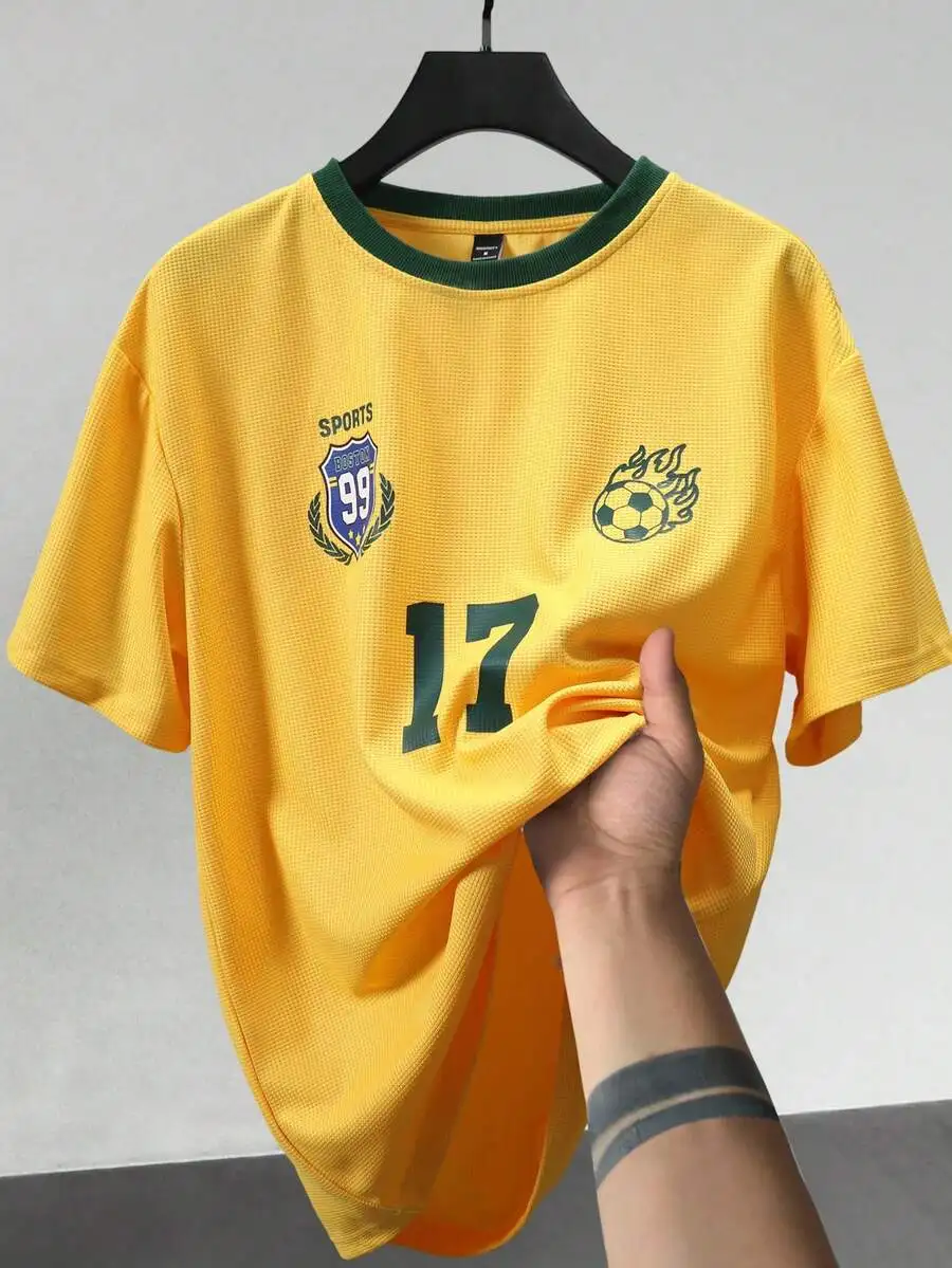 

Mens Yellow Waffle Knit Short Sleeve Tee With Green Contrast Collar, Football Graphic And Number 17 Print, Casual Sport Style