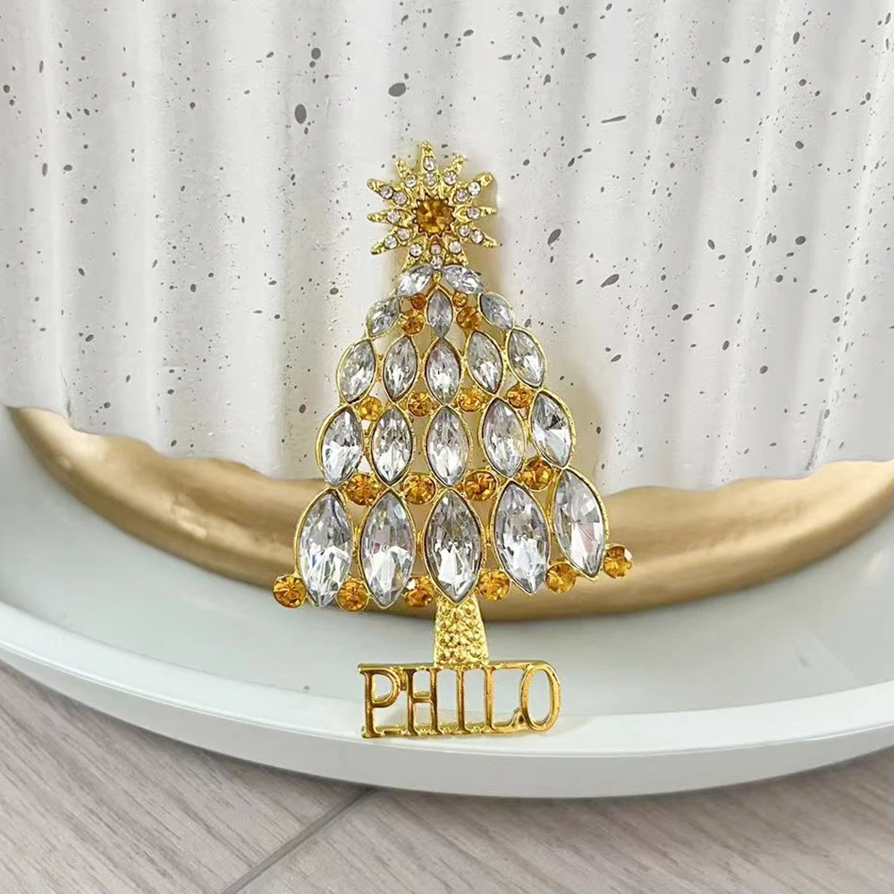 بروش شجرة عيد الميلاد من جمعية الأخت اليونانية PHILO