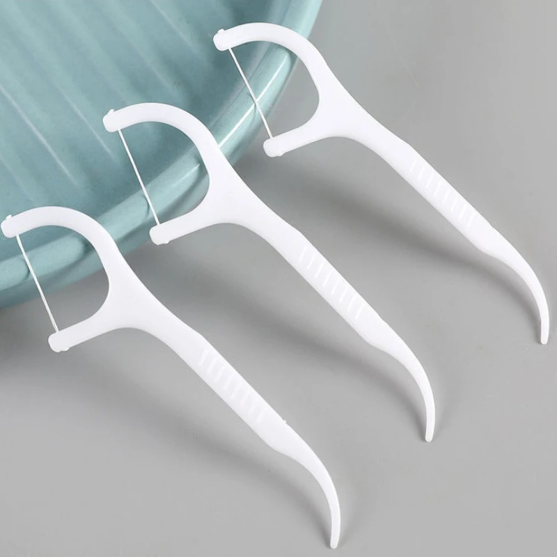 50PCS/Box Portable Disposable Dental Floss Pick Superfine Plastic Toothpick High-tension Tooth Floss Box Cleaning Oral Care