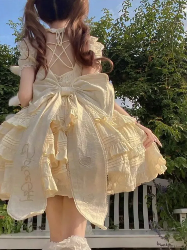 

Milky Yellow Back Dress Puffy Trailing Skirt