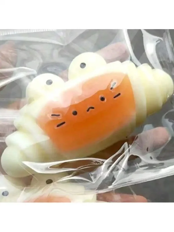 1-piece simulated caramel croissant squeezable toy, food-grade silicone handmade stress-relieving squeeze toy, high-appearance f