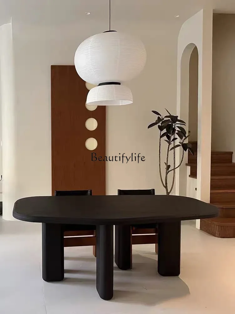 

FGMedieval solid wood dining table surprised by the quiet wind French retro black special-shaped oak dining table
