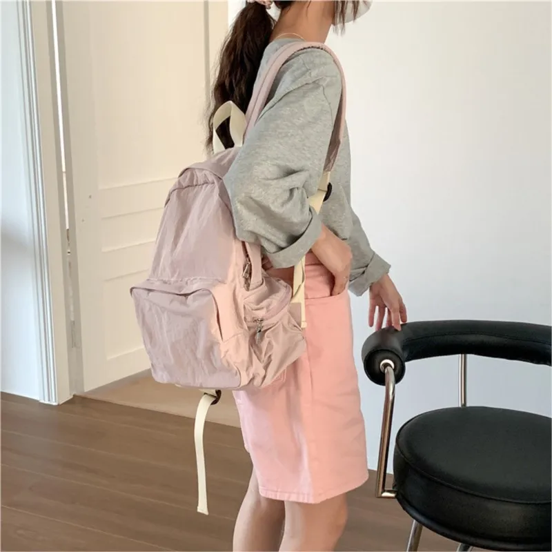 Zaino per studenti universitari di grande capacità donna 2024 borsa da scuola per zaino in Nylon coreano di nuova moda Versatile zaini Casual solidi