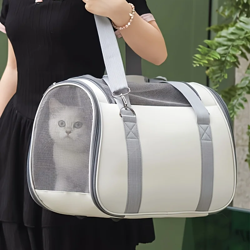 

Portable foldable pet handbag with ventilation net and ergonomic handle light and durable with safety zipper closed Pet supplies