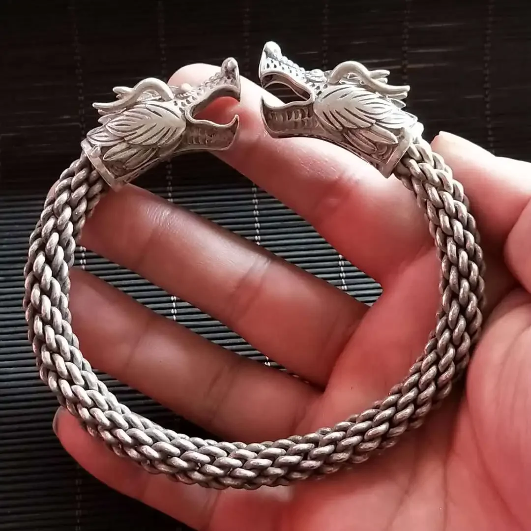 

Wholesale of white copper jewelry, Miao silver jewelry accessories, Tibetan silver double dragon silver bracelets by manufactur