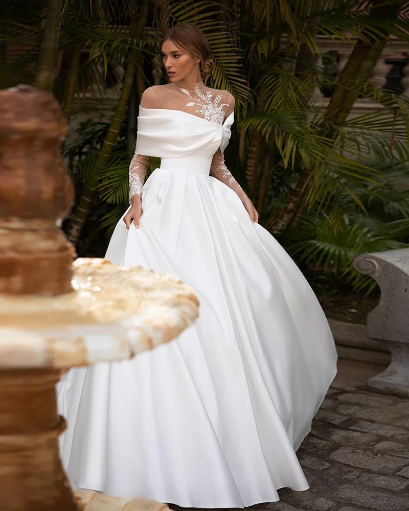 Flavinke personalizado elegante o-pescoço manga longa botões até as costas apliques cetim a linha vestidos de casamento áfrica do sul